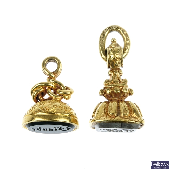 Two early 20th century gold miniature fob seals.