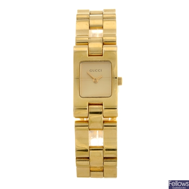 A gold plated quartz lady's Gucci 2305L bracelet watch.