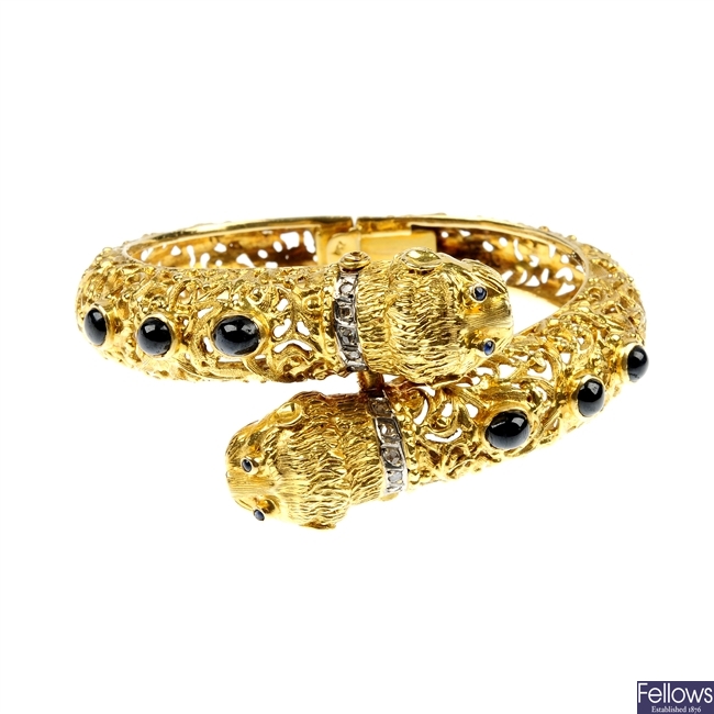 A continental sapphire and diamond panther bangle.