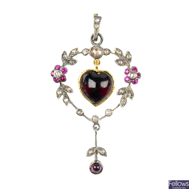 A garnet, ruby and diamond pendant.