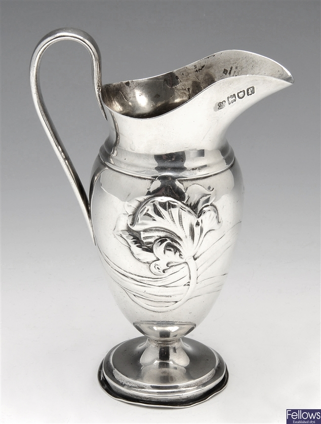 Art Nouveau silver cream jug.