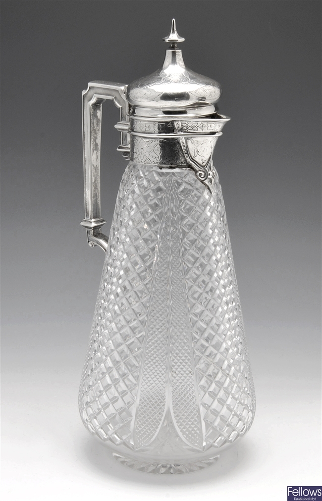 Victorian silver mounted cut glass claret jug.