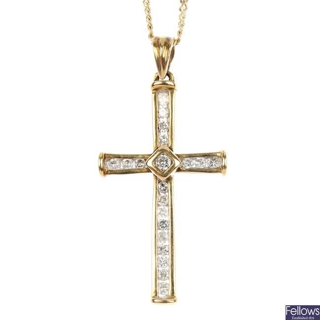 A 9ct gold diamond cross pendant.