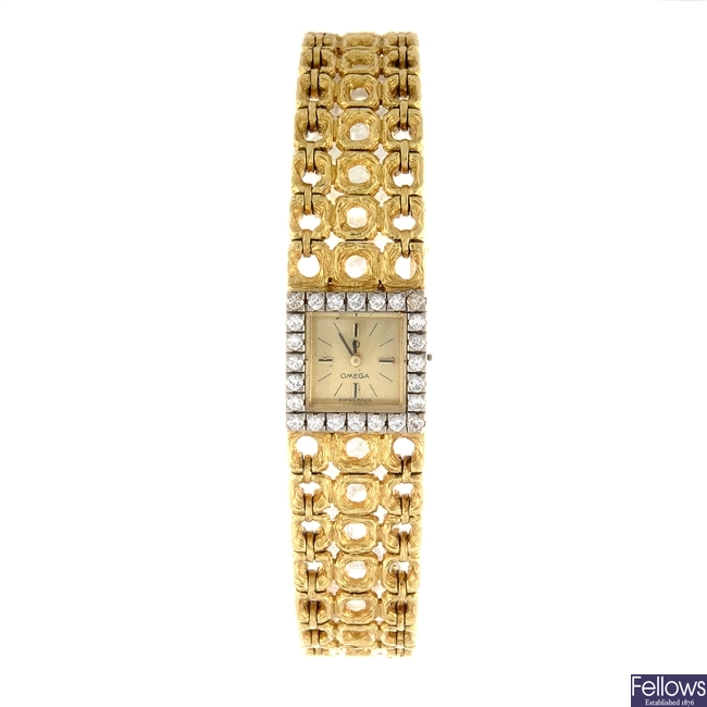 An 18k gold manual wind lady's Omega bracelet watch.