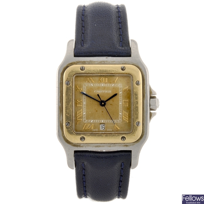 A bi-metal quartz Cartier Santos wrist watch.