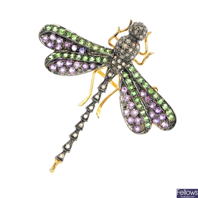 A multi-gem dragon fly brooch.