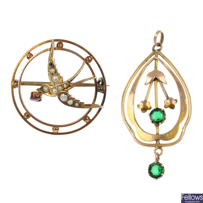Two early 20th century gold paste-set pendants and a brooch. 