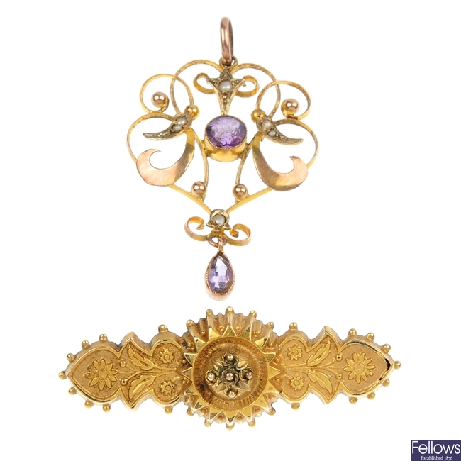 An early 20th century 9ct gold gem-set pendant and Victorian brooch.