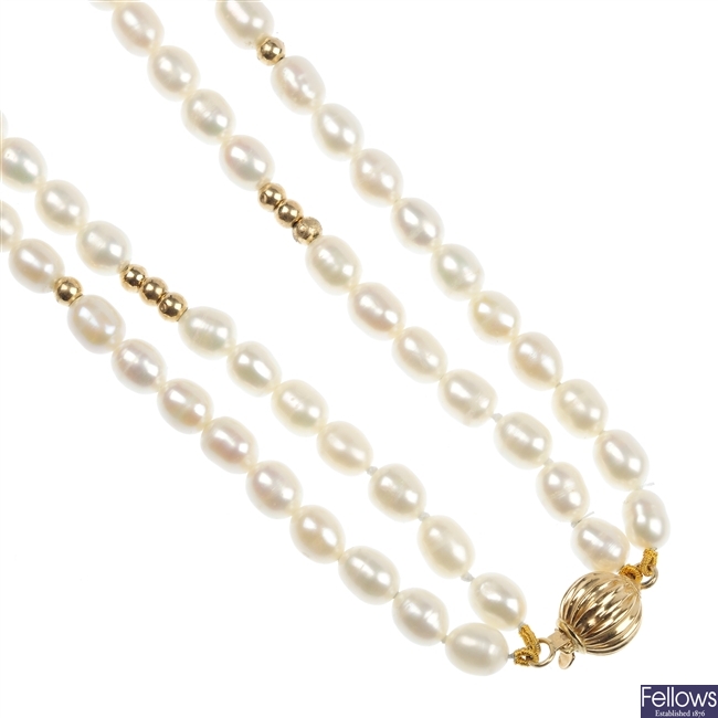 Three cultured pearl necklaces.
