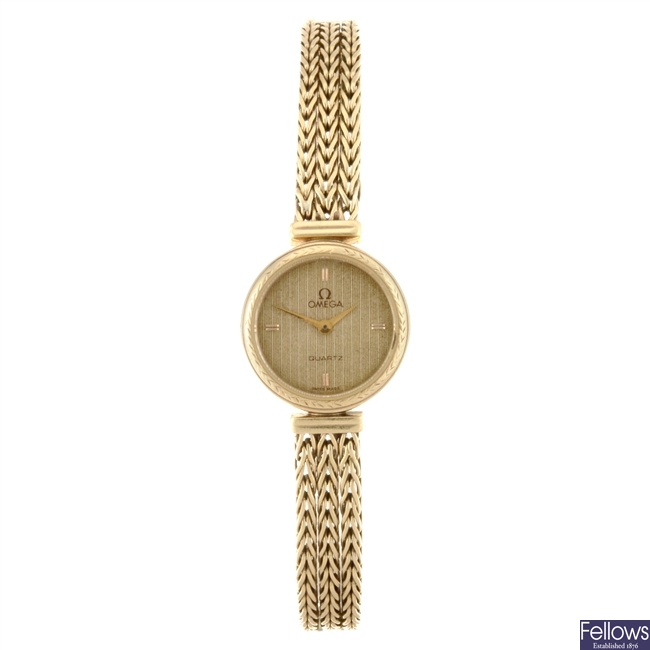 A 9k gold quartz lady's Omega bracelet watch.