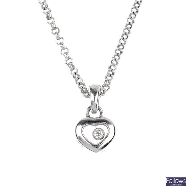 (118586-1-A) A Chopard diamond pendant with case.