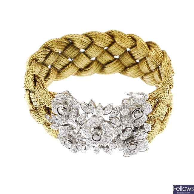 (119158-1-A) A diamond bi-metal woven bracelet.