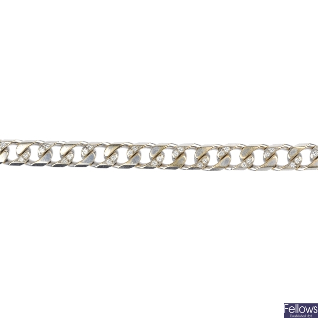 (119191-1-A) A diamond curb-link bracelet.