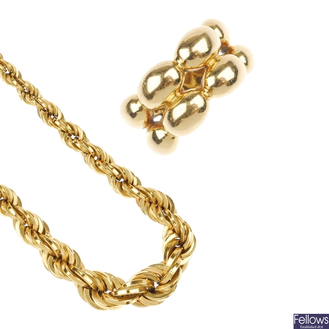 (117553-7-A) An 18ct rope-twist necklace and a dress ring .
