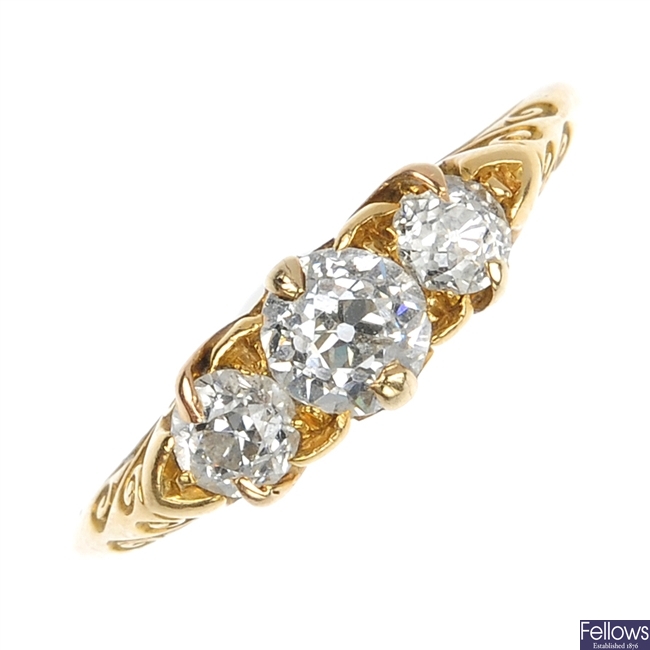 An early 20th century 15ct gold diamond three-stone ring. 
