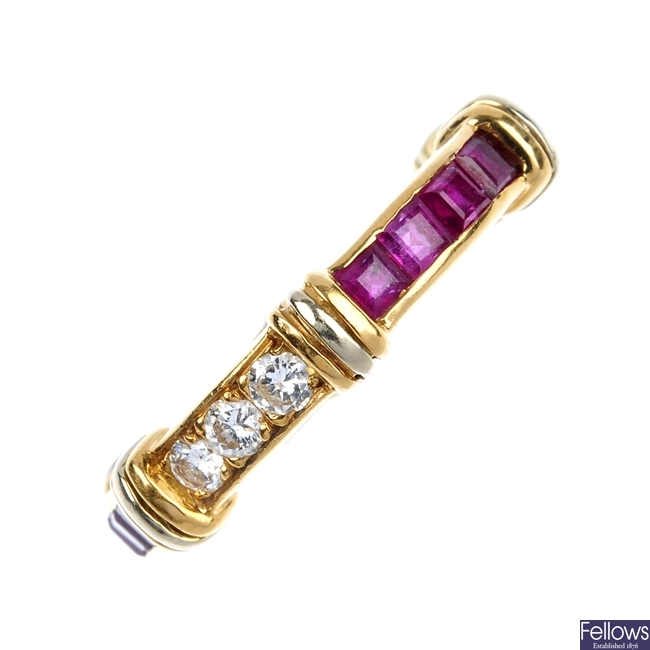(400007-1-A) CARTIER- An 18ct gold diamond and ruby full-circle eternity ring.