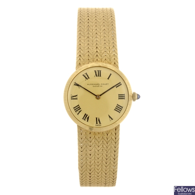 (526645-1-A) An 18k gold manual wind lady's Audemars Piguet bracelet watch.