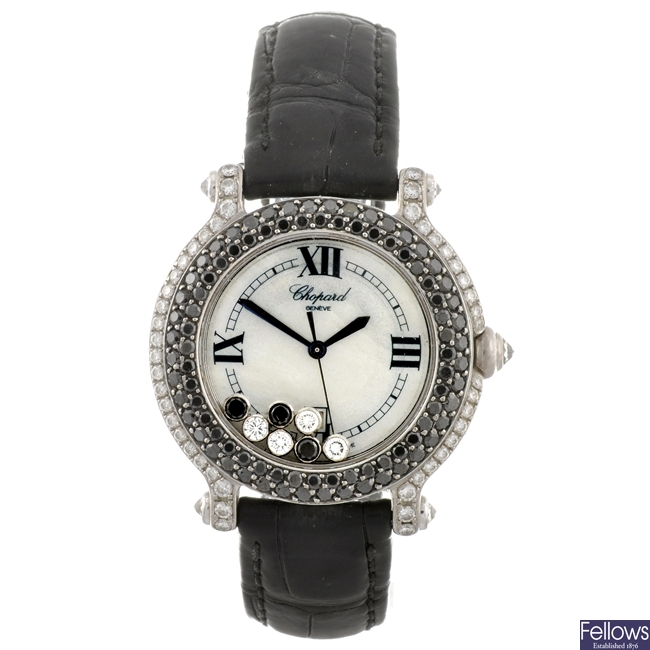 (527462-1-A) An 18ct white gold quartz lady's Chopard Happy Sport wrist watch.