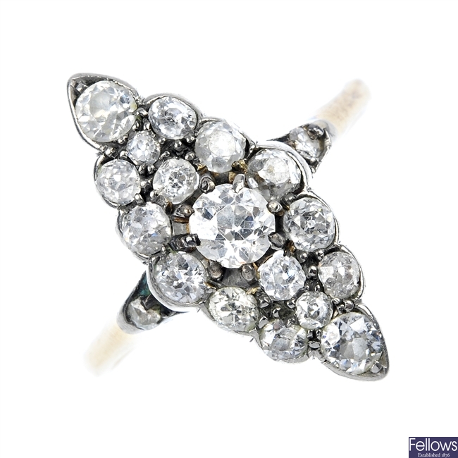 (527714-1-A) An old cut diamond marquise-shaped cluster ring.