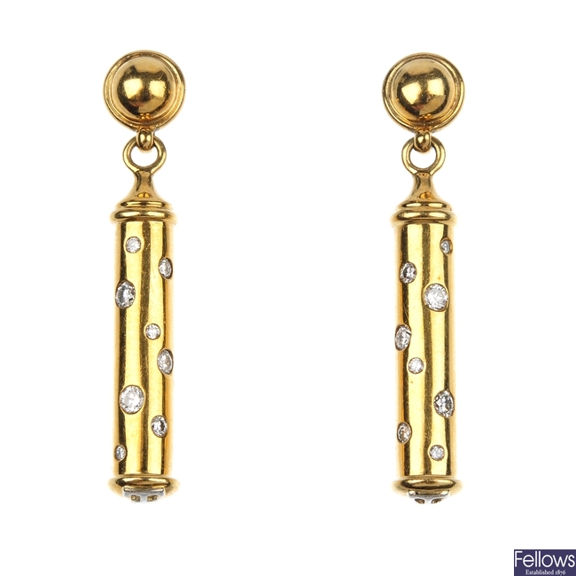 THEO FENNELL - a pair of diamond 'Shaft' ear pendants.