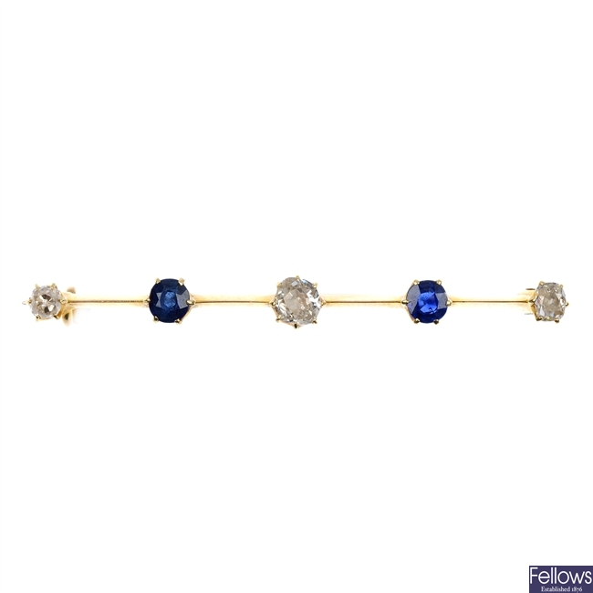 A mid 20th century gold sapphire and diamond bar brooch.