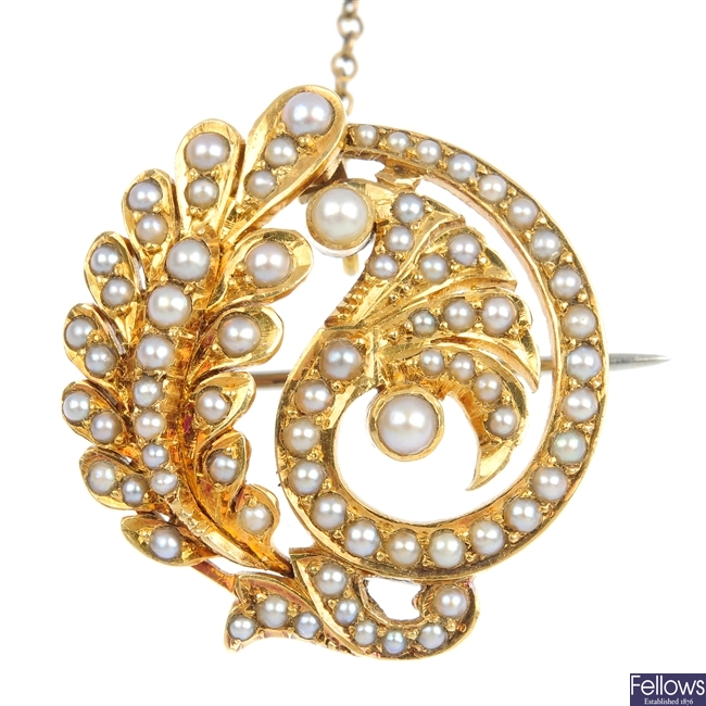 An early 20th century gold seed pearl foliate brooch.