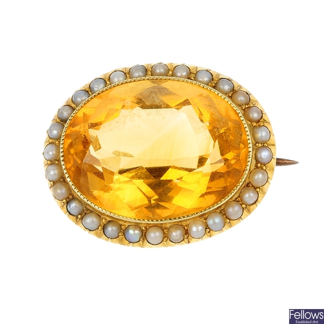 A late 19th century 15ct gold oval citrine and seed pearl brooch.