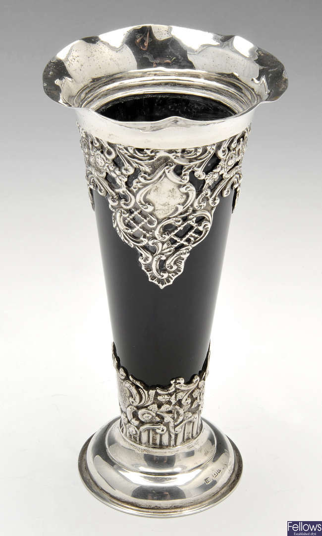 A turn of the century silver mounted glass bud vase.