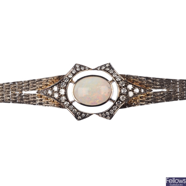 A 1970s 18ct gold opal and diamond bracelet.