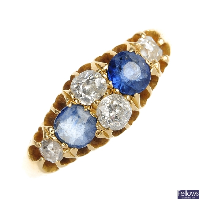 An early 20th century 18ct gold sapphire and diamond seven-stone ring.