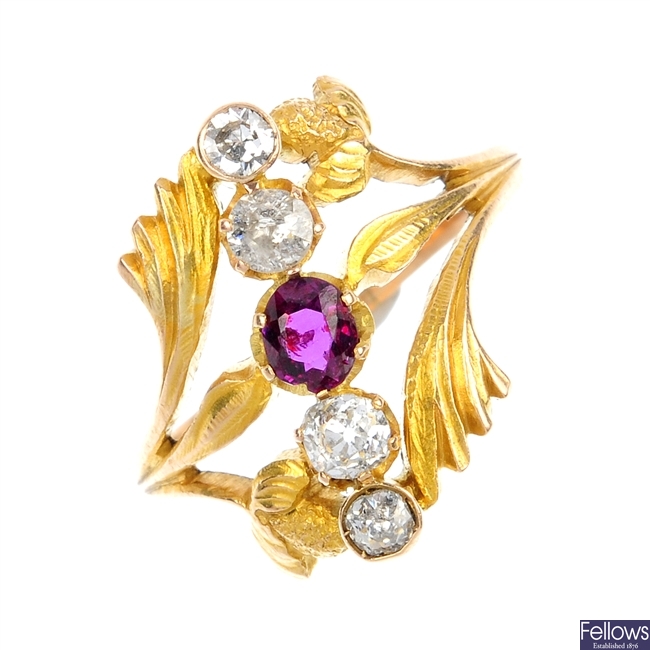 An early 20th century 18ct gold diamond and ruby floral dress ring.