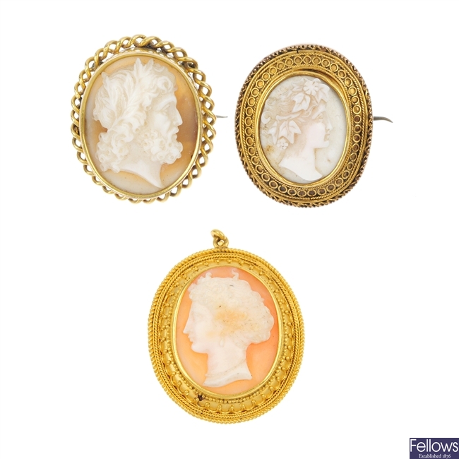 Two late 19th century 18ct gold shell cameo brooches and a pendant.