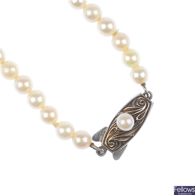 A cultured pearl necklace, pendant and a ring.