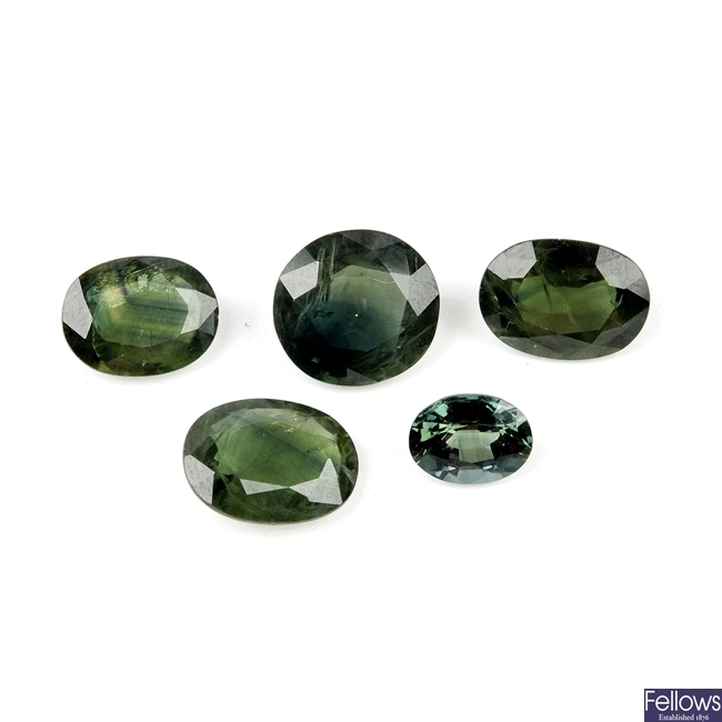 Five oval-shape green sapphires.