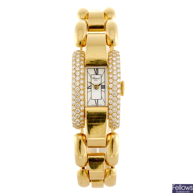 An 18k gold diamond set quartz lady's Chopard bracelet watch.