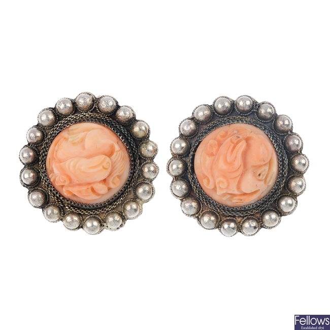 A pair of late 19th century oriental silver coral ear clips and a ring.