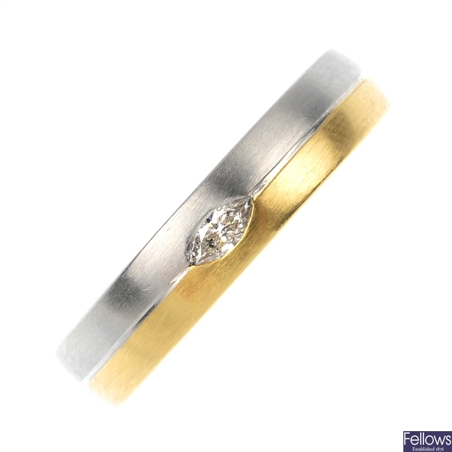 An 18ct gold and platinum diamond band ring.