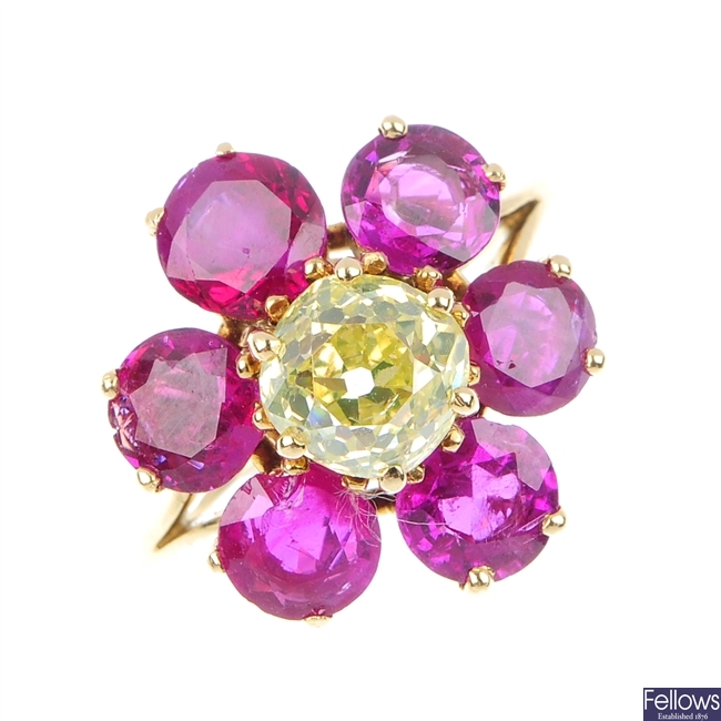 An 18ct gold diamond and ruby flower ring.