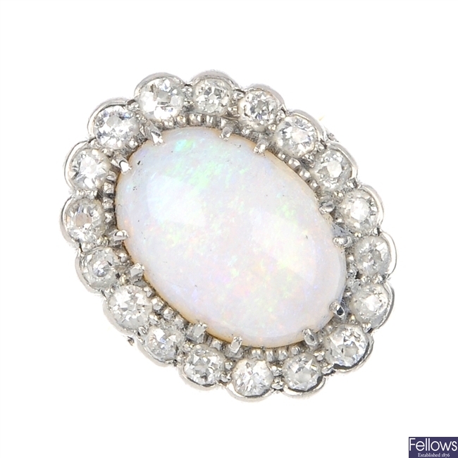 A mid 20th century 18ct gold and platinum opal and diamond cluster ring