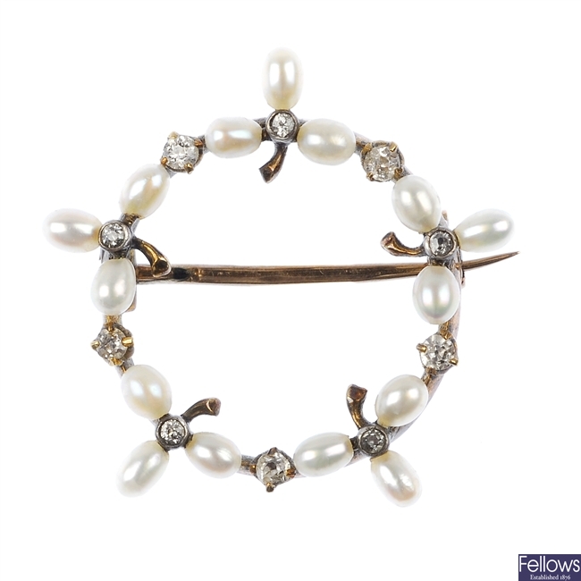 An early 20th century 12ct gold diamond and seed pearl wreath brooch.