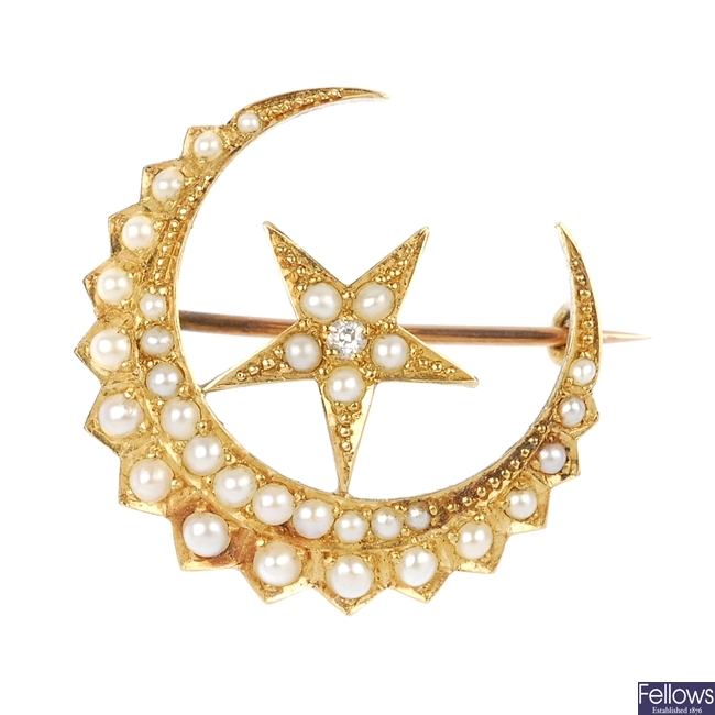 An early 20th century 18ct gold split pearl and diamond star and crescent brooch