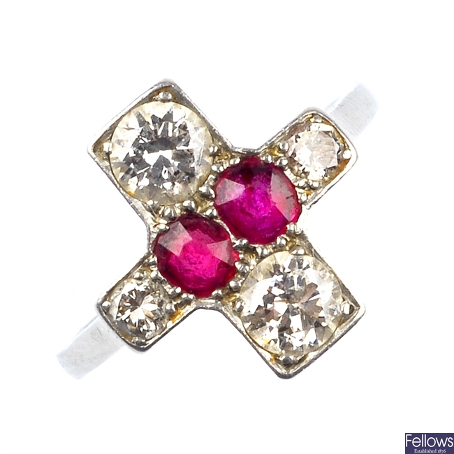 A mid 20th century 18ct gold and platinum ruby and diamond dress ring.