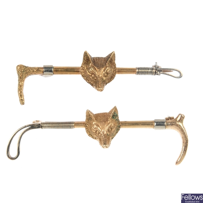 Two early 20th century gold fox head bar brooches and a Masonic ball.