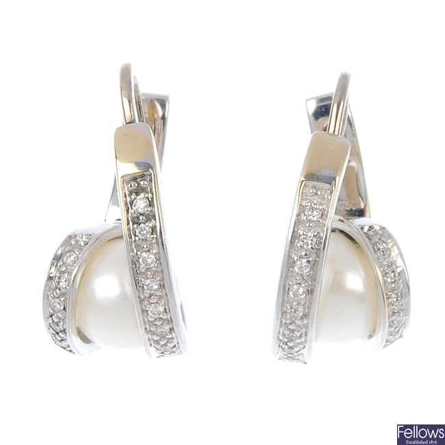 A pair of cultured pearl and diamond earrings.