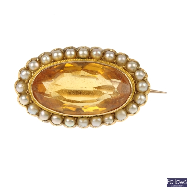 A late 19th century 15ct gold citrine and split pearl brooch.