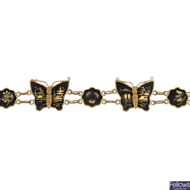 Three Damascene bracelets, a further bracelet and a pair of ear pendants.