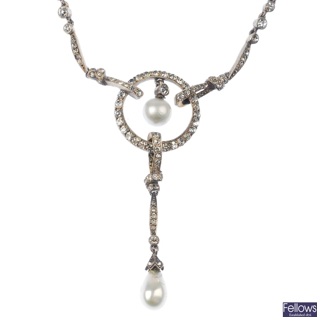 A mid 20th century silver paste and imitation pearl necklace. 