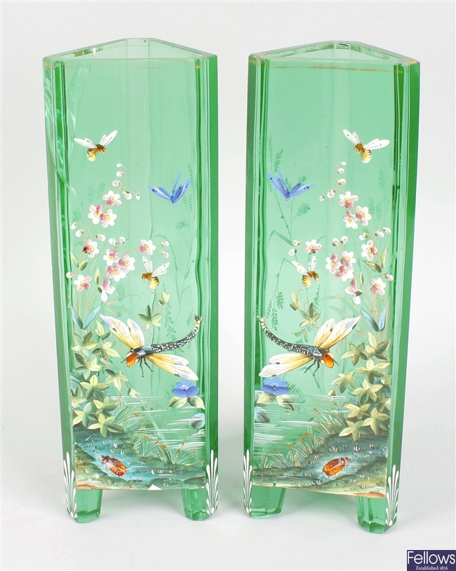 A good pair of enamelled emerald green glass vases