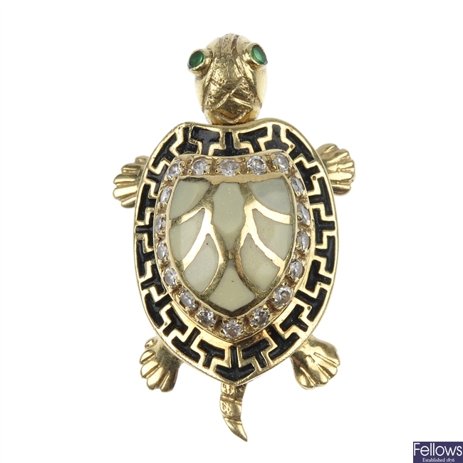 A paste and enamel tortoise pendant.