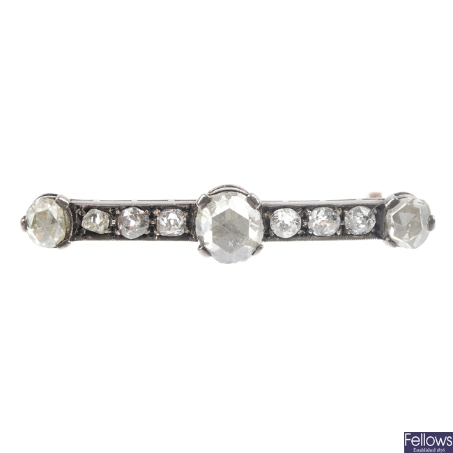 A late 19th century continental silver and gold diamond bar brooch.